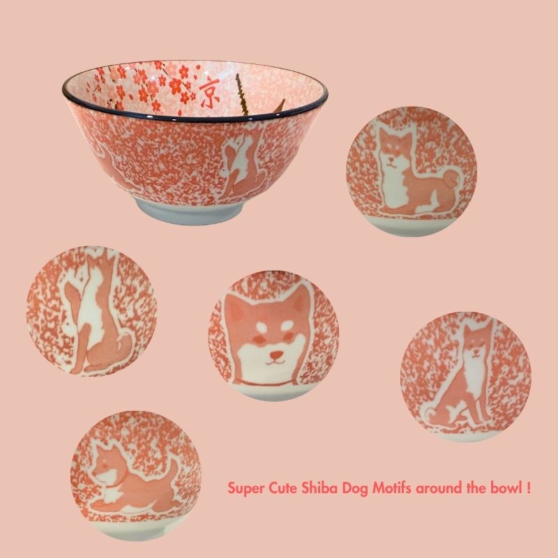 A side view of the small ceramic rice bowl. The exterior features a white-and-red Shiba dog sitting up on the speckled pink/red background, with the design extending up to the black rim.