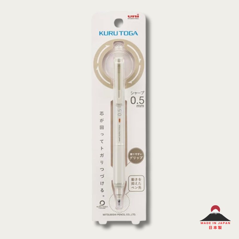 Kuru Toga 0.5 mm mechanical pencil in its original retail packaging, featuring a clear barrel and a small orange accent ring, set against a light gray background.