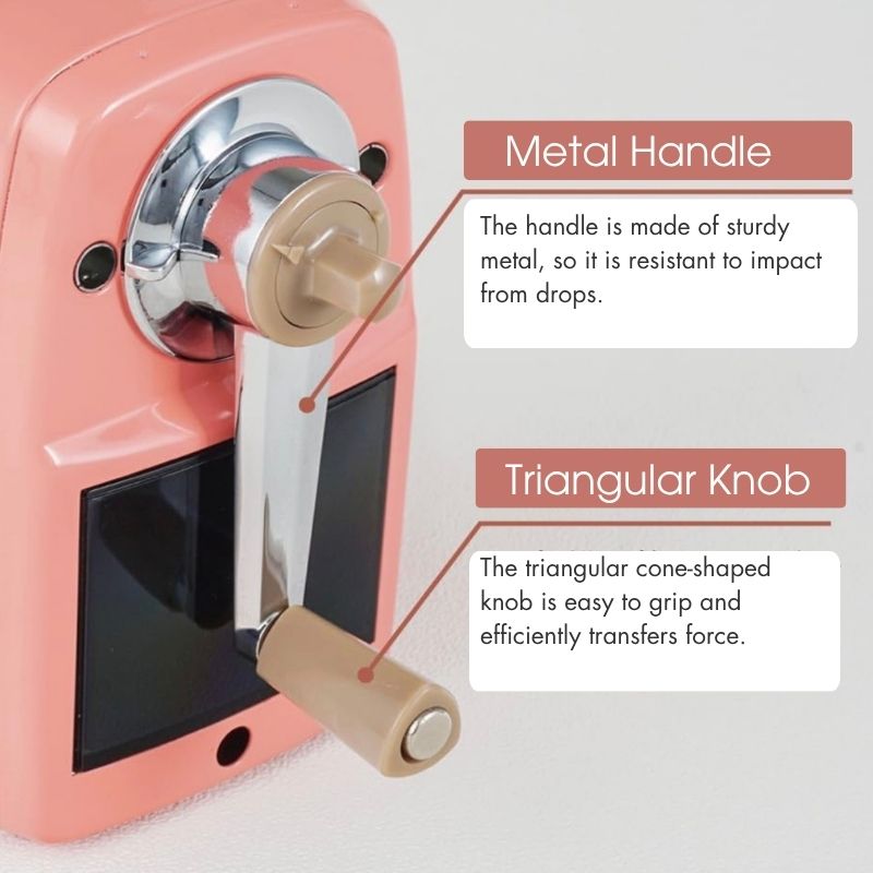Side view of the CARL Angel 5 Royal 3 pencil sharpener highlighting the durable metal handle and the ergonomic beige triangular cone-shaped knob.