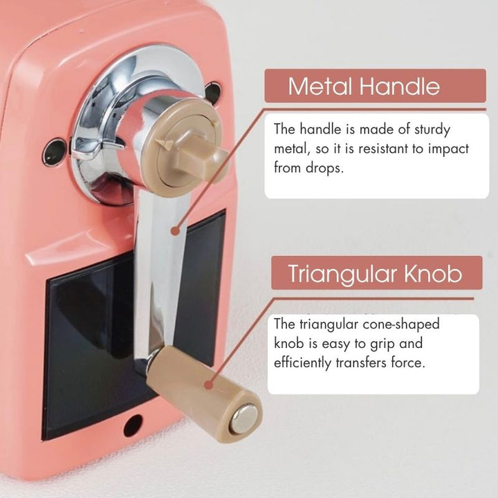 Side view of the CARL Angel 5 Royal 3 pencil sharpener highlighting the durable metal handle and the ergonomic beige triangular cone-shaped knob.