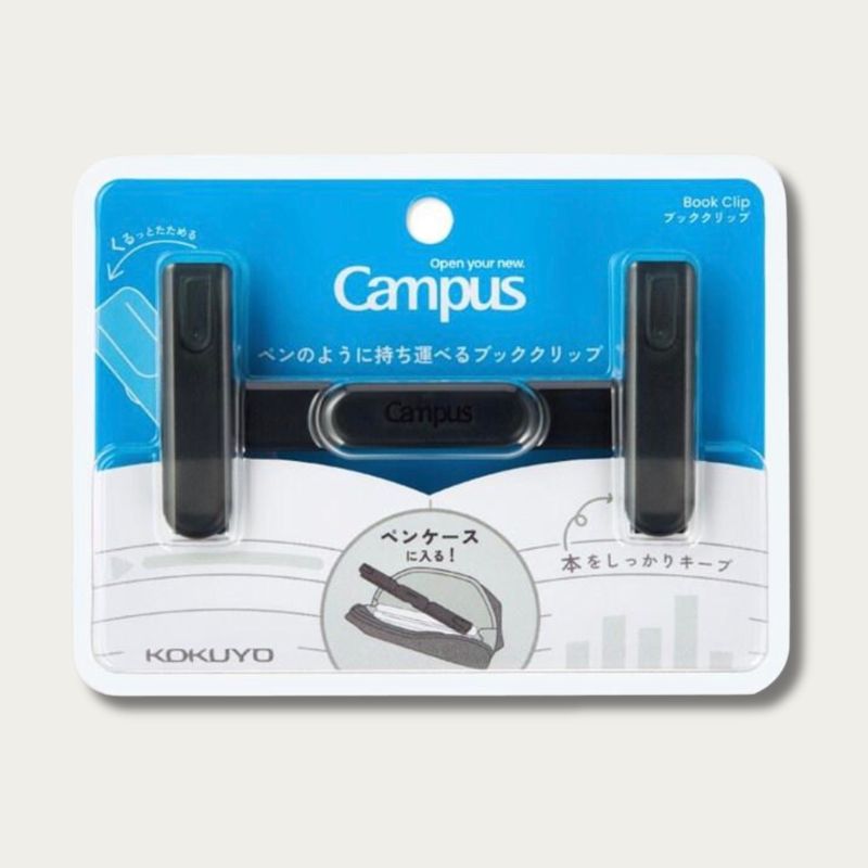 KOKUYO Campus book clip in blue and white blister packaging, showing two black clip-style book clips on a light gray background.