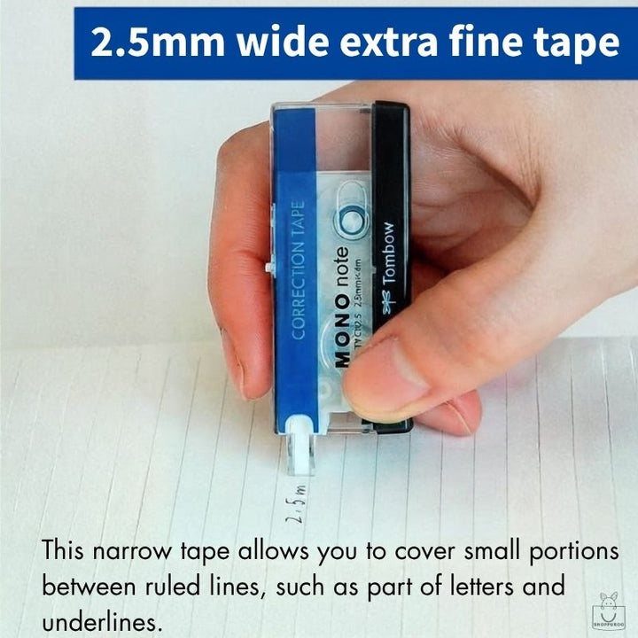 TOMBOW MONO Note Correction Tape 2.5mm extra fine tape — held over ruled notebook lines