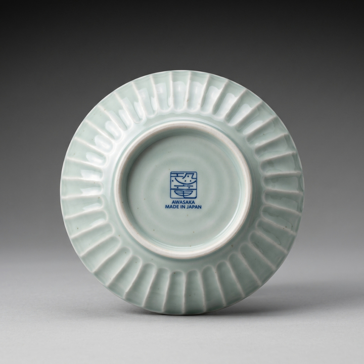 Underside of Edokko Dinosaur medium bowl showing shinogi ridged outer wall and AWASAKA Made in Japan back stamp