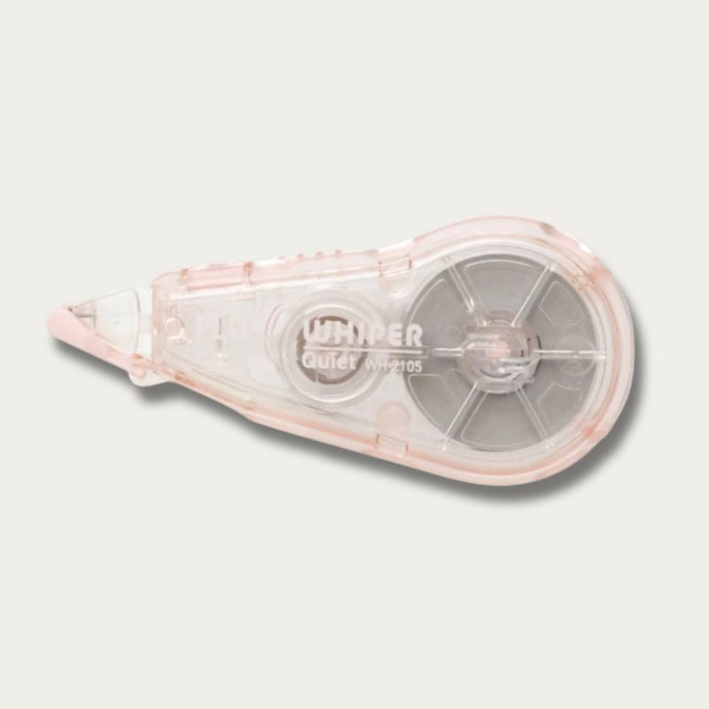 A Whimper Quiet WM2105 correction tape dispenser in a translucent pale pink and clear plastic casing, shown on a light gray background.