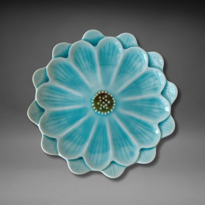 Top view of Handmade Mino-ware Crackle Glaze Flower Mini Plate in turquoise blue — Japan-made ceramic dish featuring intricate petal shape and fine crackle glaze texture.