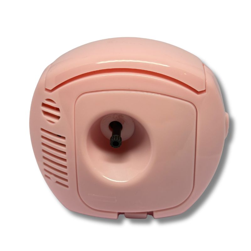 Back of Hello Kitty Table Alarm Clock showing battery compartment and alarm dial – 2 AA battery operated.