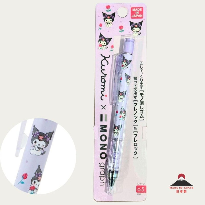 Packaged Tombow Mono Graph x Sanrio Kuromi 0.5mm mechanical pencil featuring a light purple floral design, "Made in Japan" logo, and a close-up inset of the Kuromi and rose pattern on the barrel.