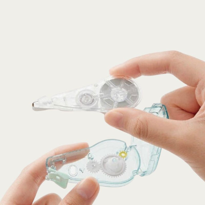 Inserting refill cartridge into PLUS Whiper Quiet correction tape body