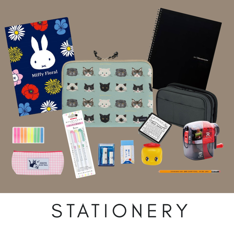 Collection of stationery items including notebooks, pouches, and stationery supplies on a beige background.