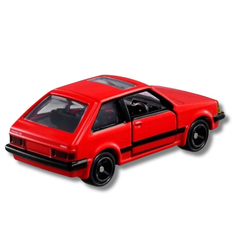 Tomica Reborn Mazda Familia 1500XG diecast in Red — rear three-quarter view showing opening door and wheel detail