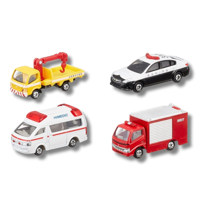 Four Tomica emergency vehicles from Set 5 — yellow crane truck, black-and-white police car, white HiMedic ambulance, and red fire engine — arranged on a clean white backdrop.